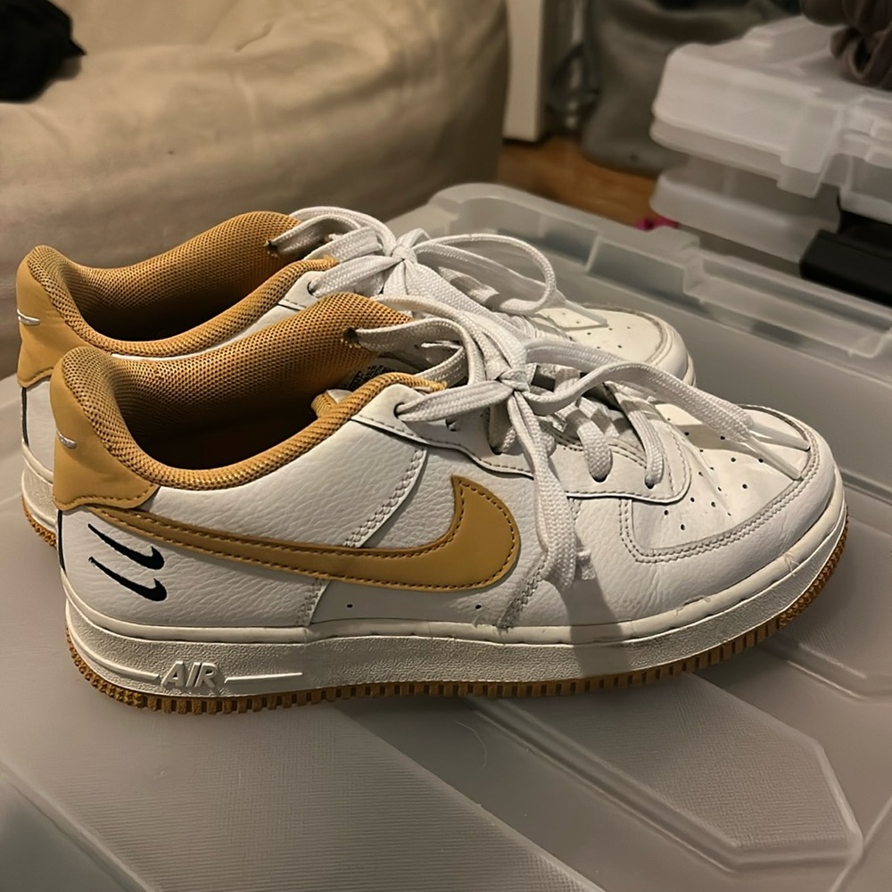 Yellow Nike Swoosh with black double check logo